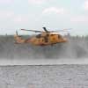 Helicopter peforming training exercises over Aylesford Lake